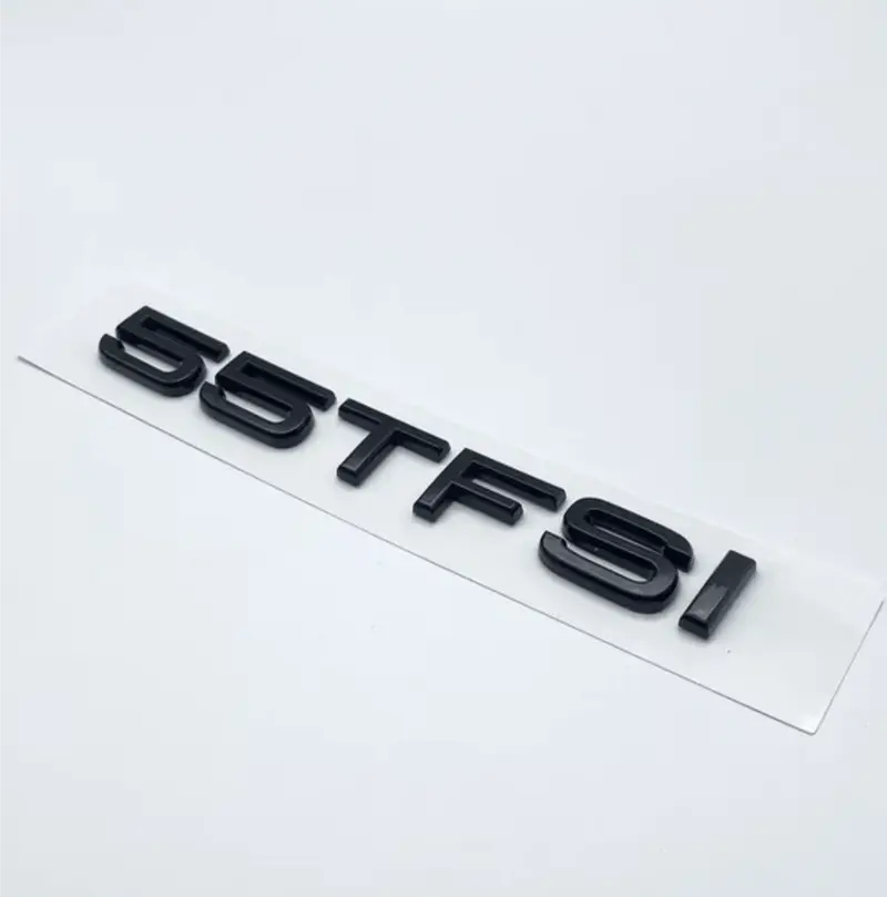 Badge de coffre lettres noires motorisation AUDI 55 TFSI